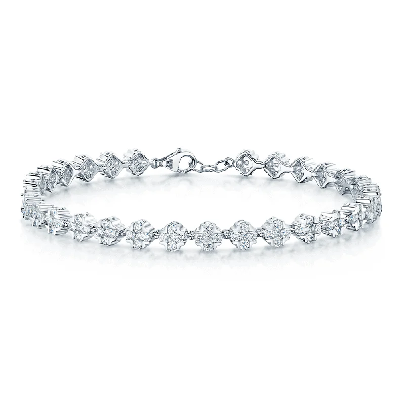 ladies bracelet intricate-18ct White Gold Round Brilliant Cut Diamond Set Cluster Bracelet