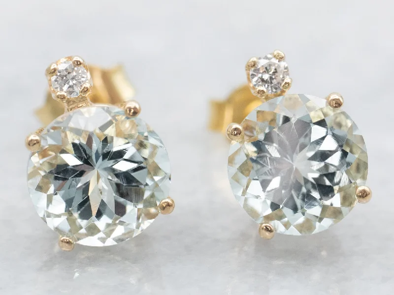 Ladies earrings fixed gem designs-Aquamarine and Diamond Gold Stud Earrings