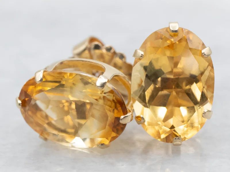 Ladies earrings raised detail styles-Oval-Cut Citrine Stud Earrings