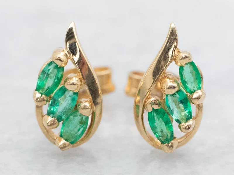 Ladies earrings sharp edge styles-Marquise Cut Emerald Stud Earrings