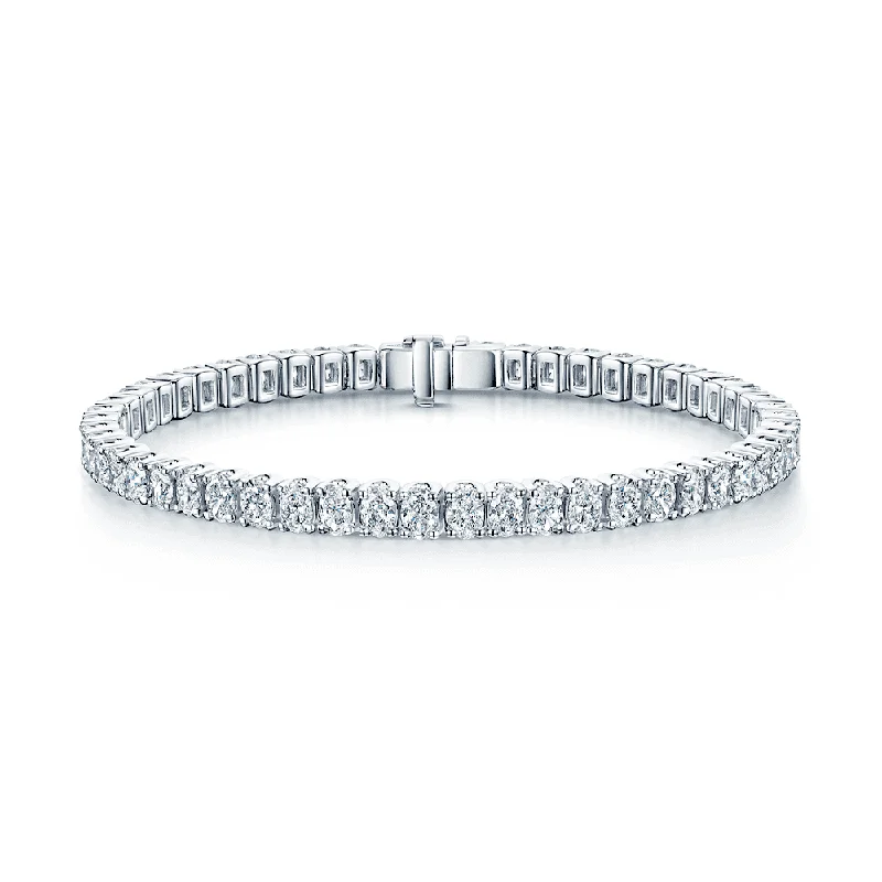 ladies bracelet shell silver-Platinum Claw Set Oval Cut Diamond Tennis Bracelet