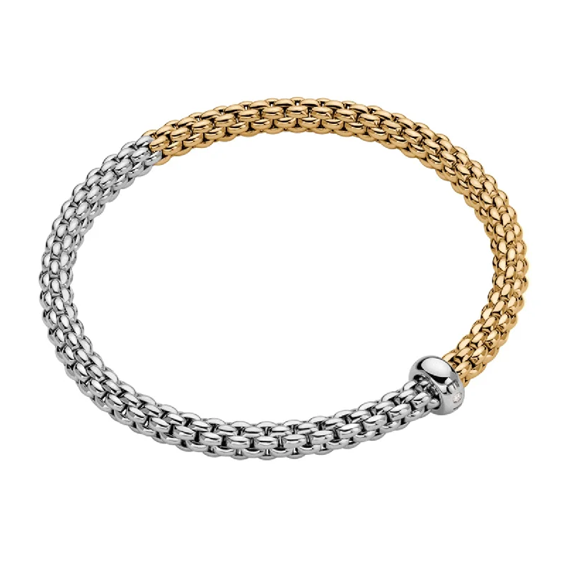 ladies bracelet artisan-Solo 18ct Yellow & White Gold Bracelet With Single Diamond Rondel