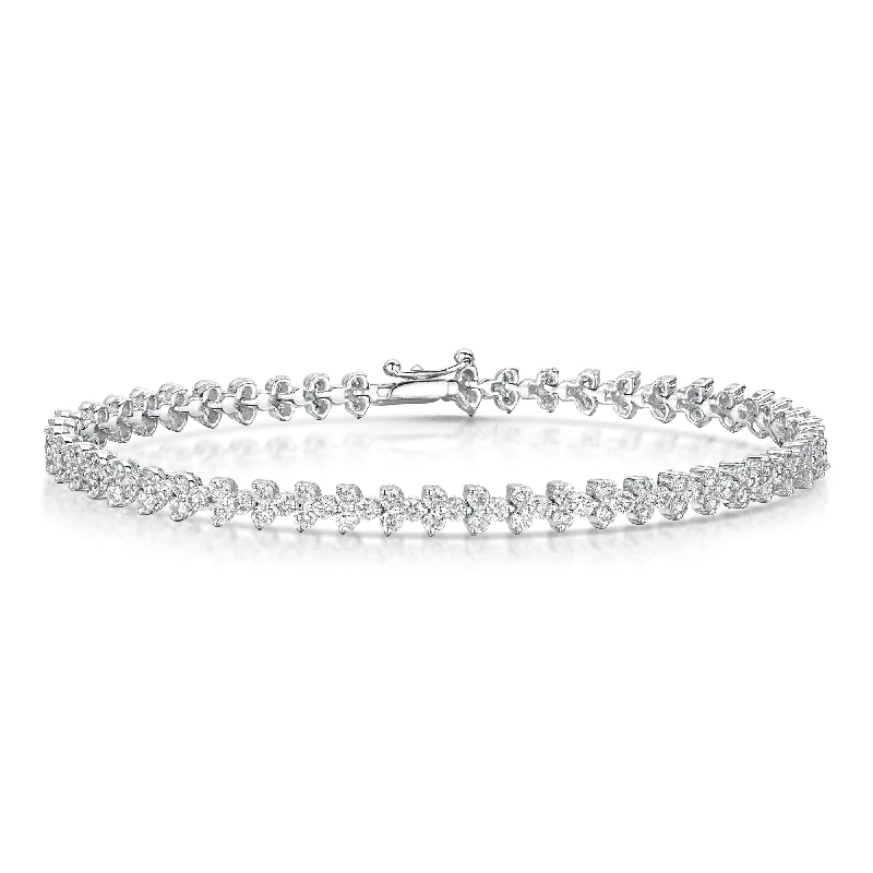 ladies bracelet party gold-18ct White Gold Round Brilliant Cut Diamond Trefoil Design Bracelet