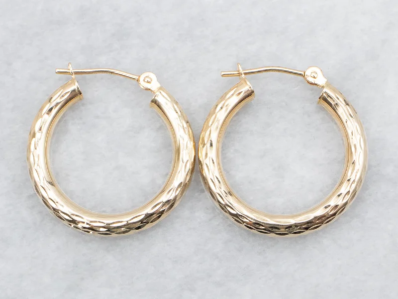 Ladies earrings youthful charm designs-Faceted Gold Hoop Earrings