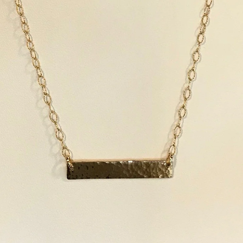 ladies necklace statement piece-Side to Side Gold Hammered Bar Necklace