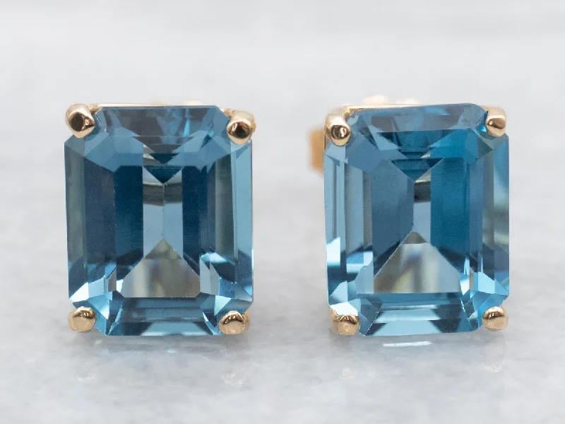 Ladies earrings radiant shine designs-Vibrant Blue Topaz Stud Earrings