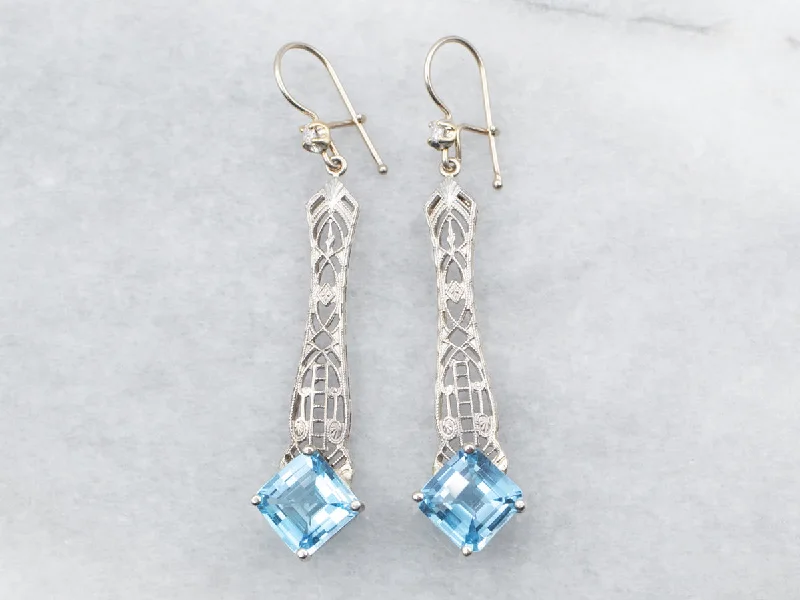 Ladies earrings comfort curve designs-White Gold Blue Topaz Filigree Drop Earrings with Diamond Accent