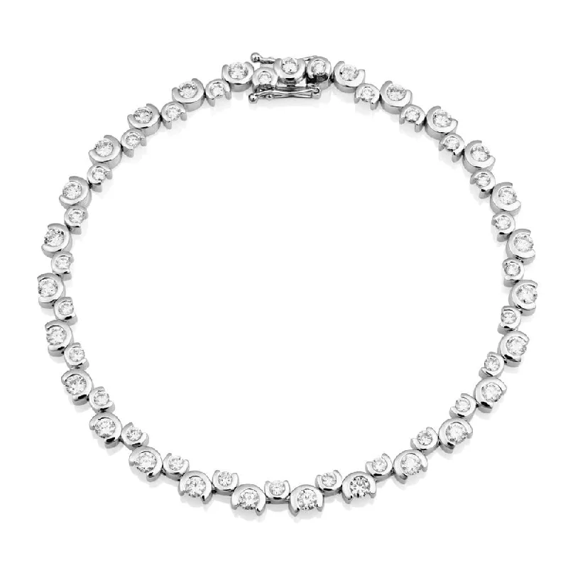 ladies bracelet twisted gold-Berry's 18ct White Gold Wave Diamond Part Rub Over Set Bracelet