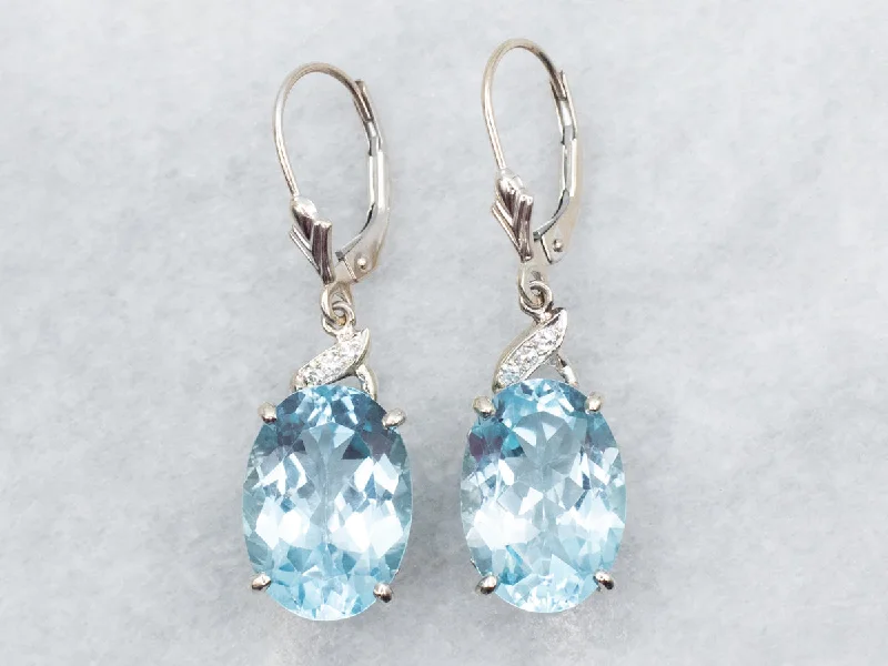 Ladies earrings milestone marker pieces-White Gold Blue Topaz and Diamond Drop Earrings